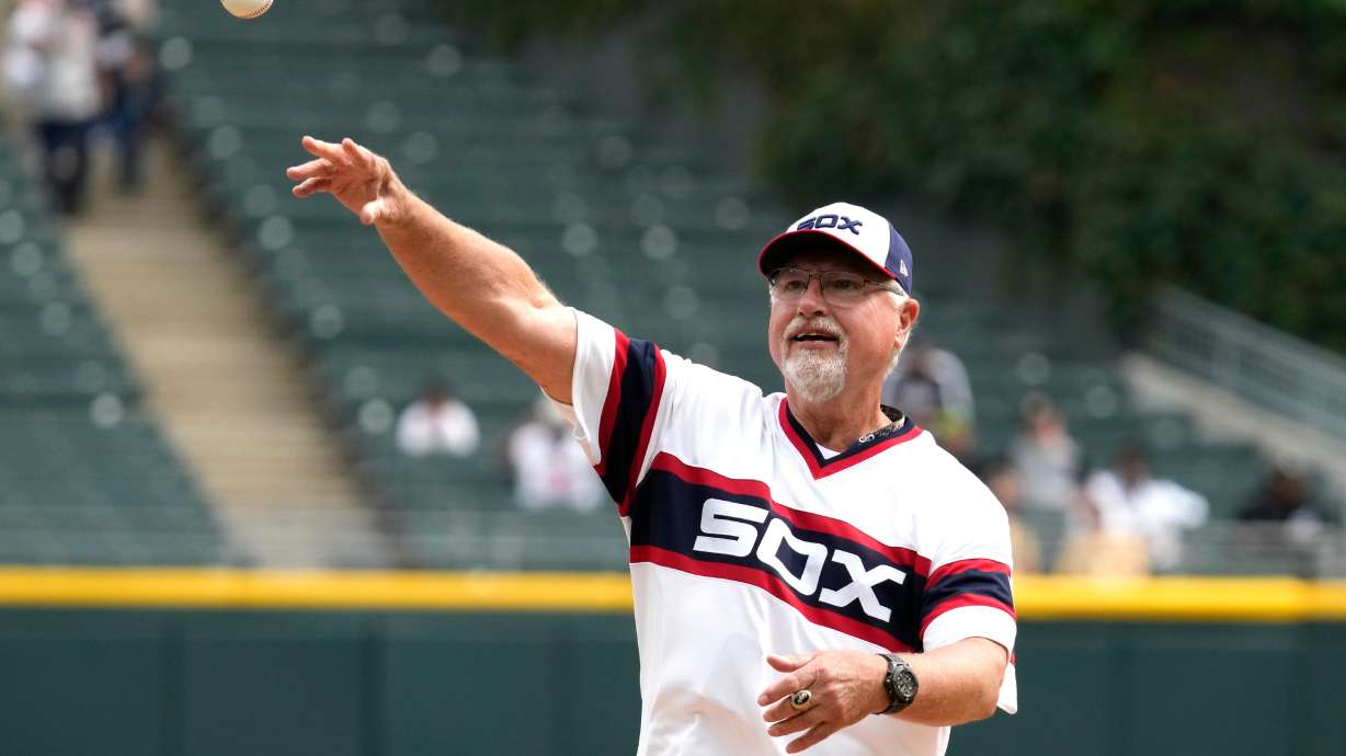 FILE - Former Chicago White Sox player Ron Kittle throws out a ceremonial first pitch before a baseball game between the Minnesota Twins and the Chicago White Sox in Chicago, Sunday, Sept. 17, 2023.