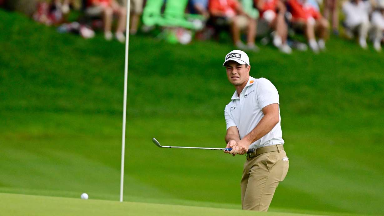 Viktor Hovland, of Norway, watches his shot land near the pin on the 15th green during the third round of the Travelers Championship golf tournament at TPC River Highlands, Saturday, June 27, 2026, in Cromwell, Conn.