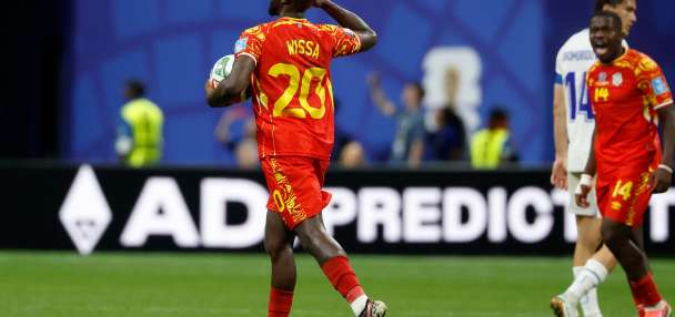 Congo rallies to a 3-1 win against Uzbekistan to seal place in the World Cup knockouts