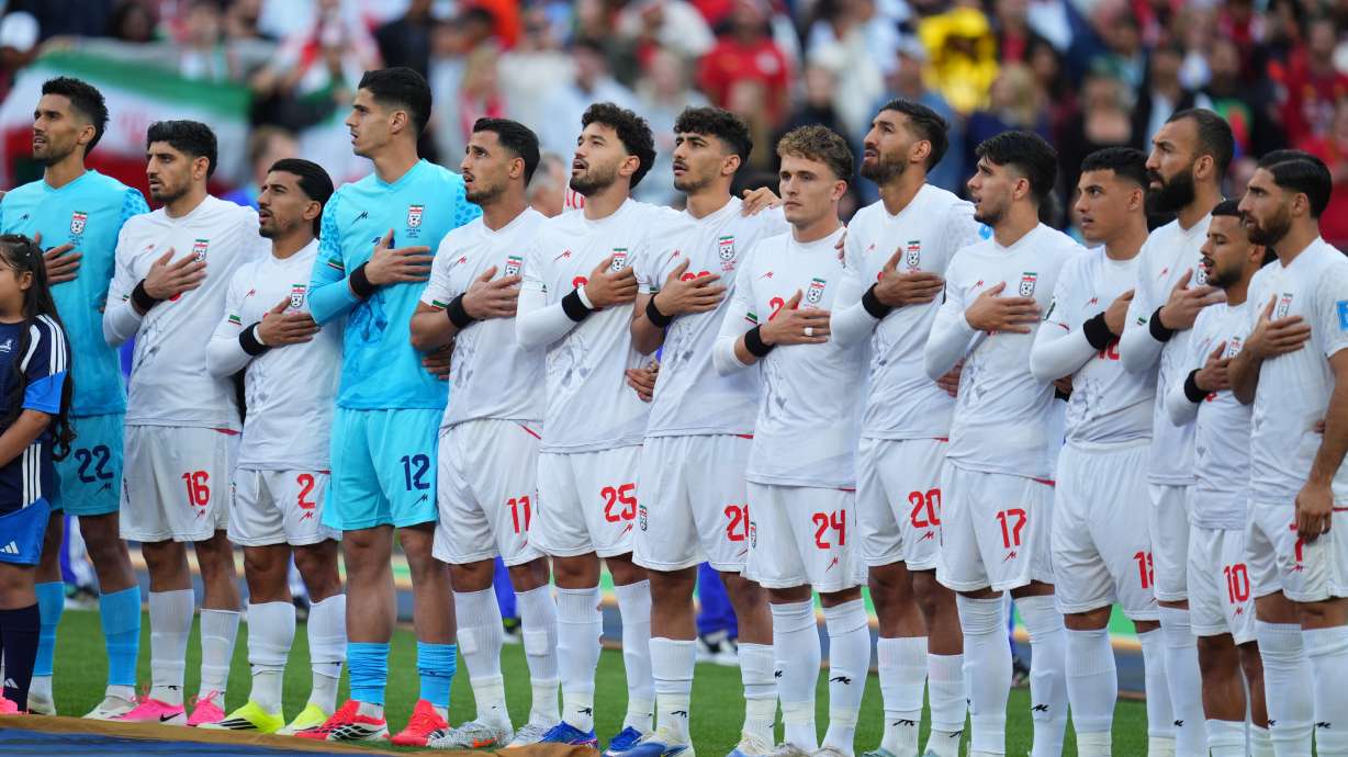 Iran's team stands for their national anthem during the World Cup Group G soccer match between Egypt and Iran in Seattle, Friday, June 26, 2026.