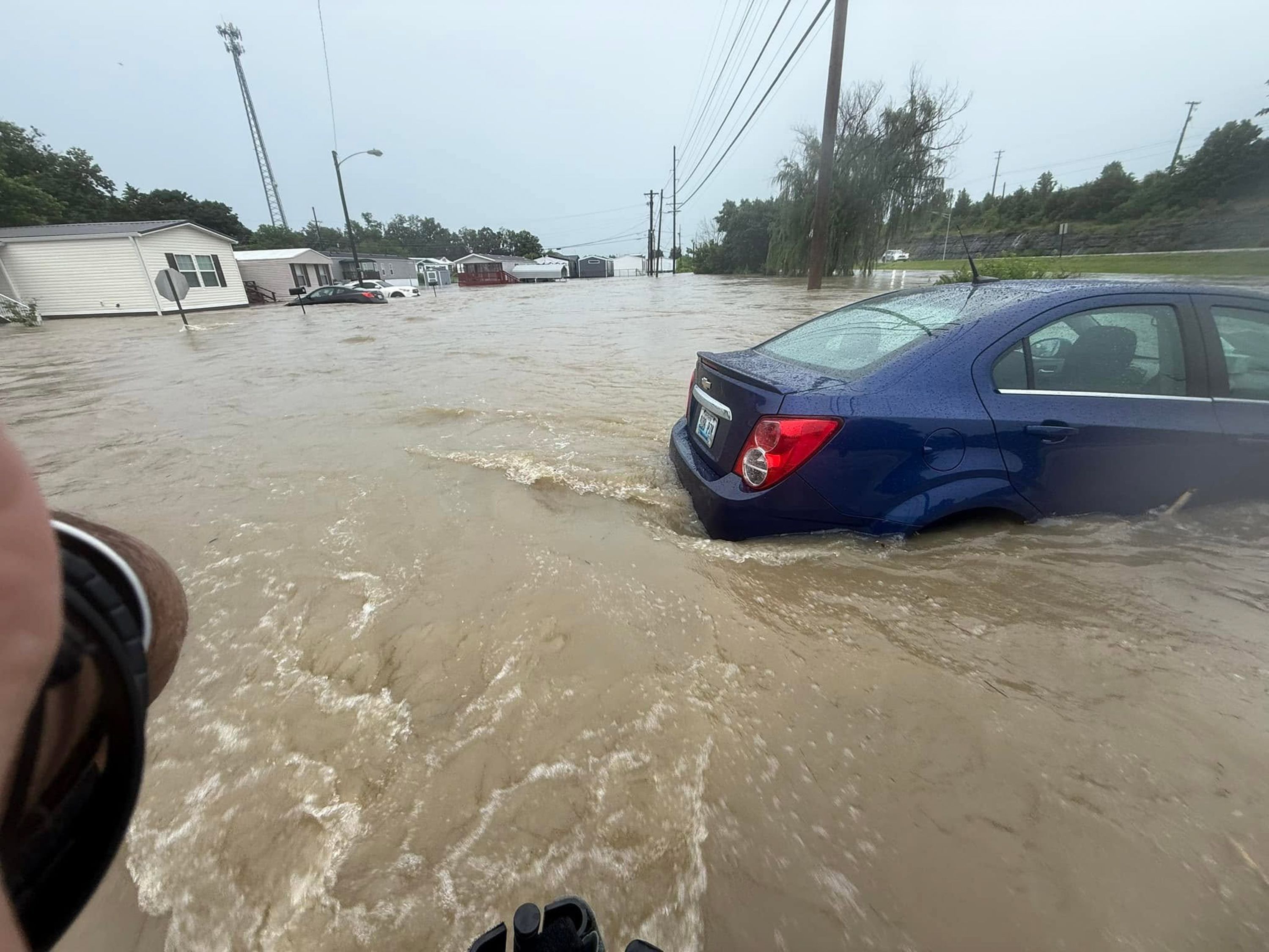 Conditions improve after widespread flooding and heavy rain kill at least 4 in Kentucky