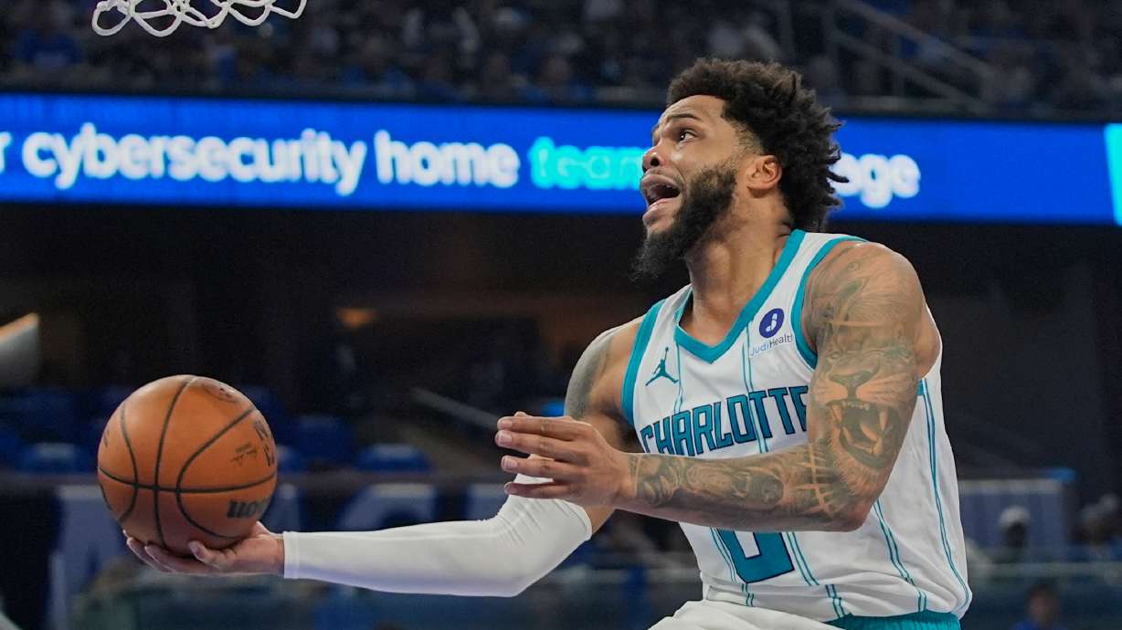 FILE - Charlotte Hornets forward Miles Bridges makes a shot against the Orlando Magic during the second half of an NBA play-in tournament basketball game, Friday, April 17, 2026, in Orlando, Fla.