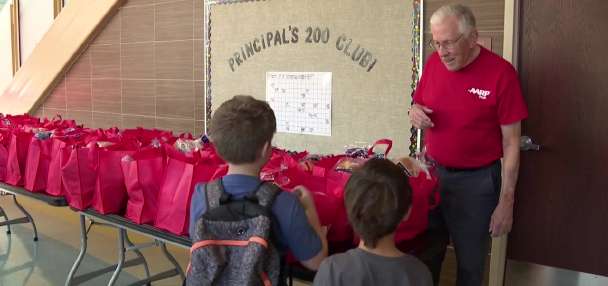 Helpers with mobile pantry at Midvale Elementary know need has no season
