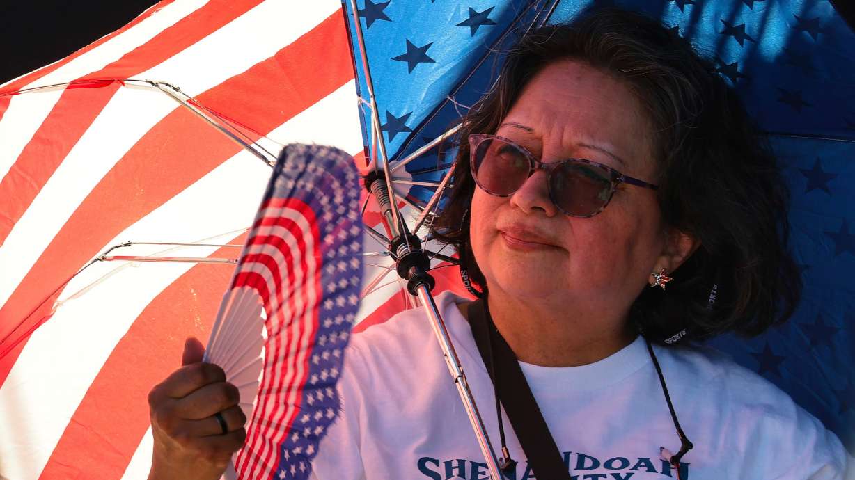 An attendee of last week's Great American State Fair Kickoff Celebration fans herself during festivities on the National Mall in Washington, DC.