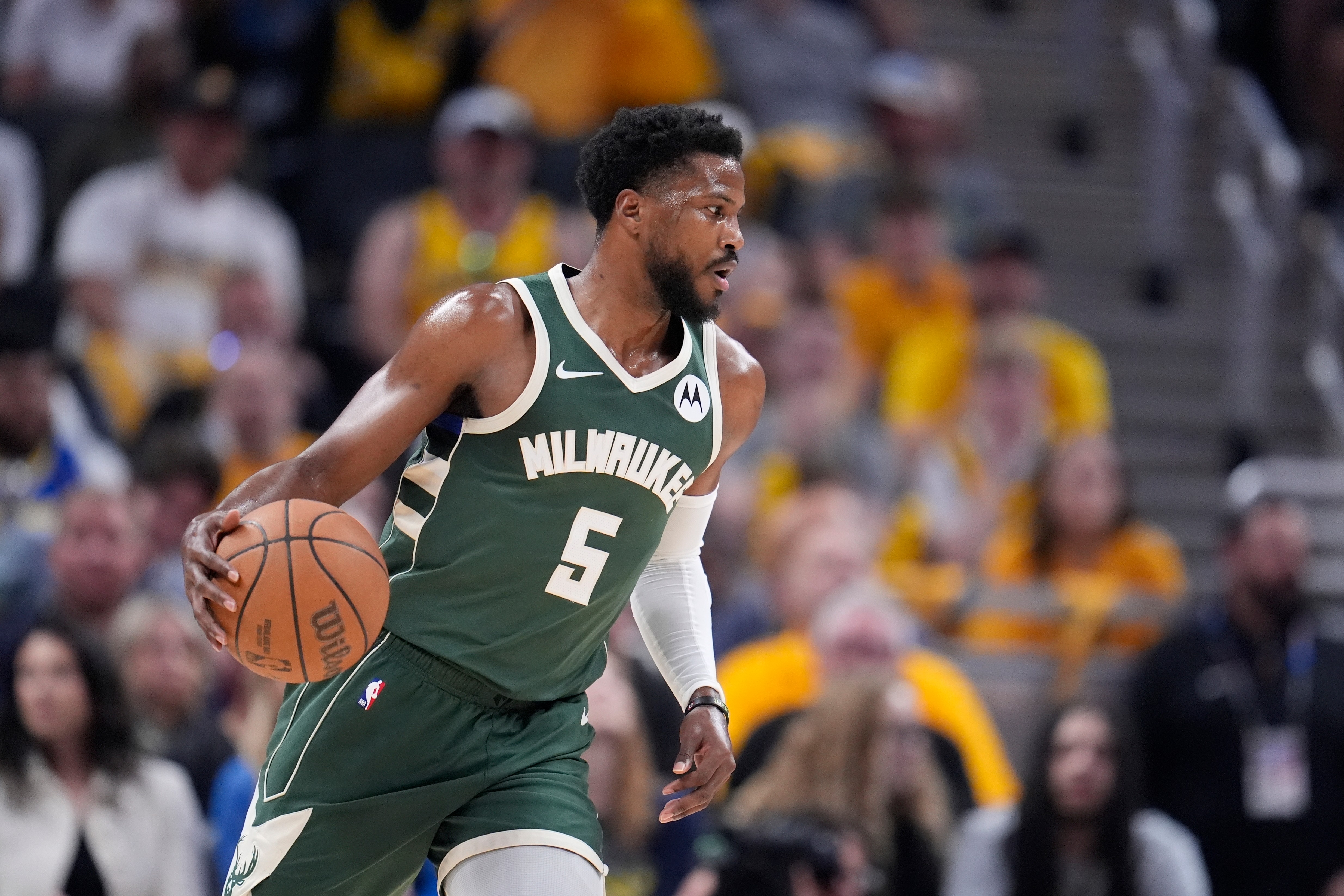 FILE - Milwaukee Bucks' Malik Beasley dribbles during the first half of Game 4 of the first round NBA playoff basketball series against the Indiana Pacers, April 28, 2024, in Indianapolis. 