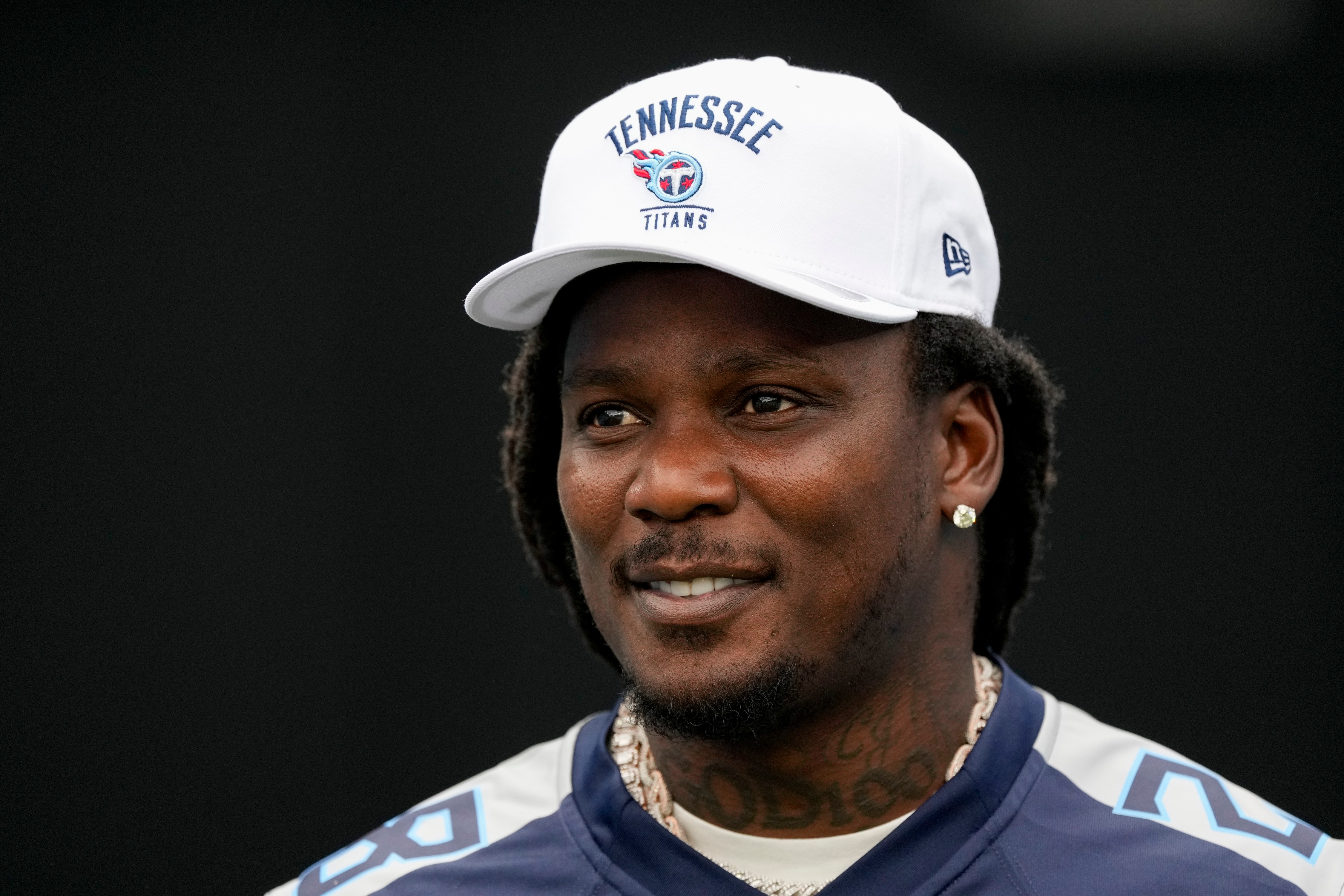 FILE - Former Tennessee Titans running back Chris Johnson visits the field during the second half of an NFL football game against the New York Jets, Sept. 15, 2024, in Nashville, Tenn. 