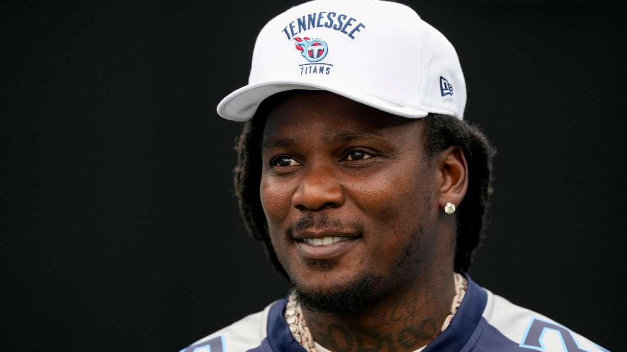 FILE - Former Tennessee Titans running back Chris Johnson visits the field during the second half of an NFL football game against the New York Jets, Sept. 15, 2024, in Nashville, Tenn.