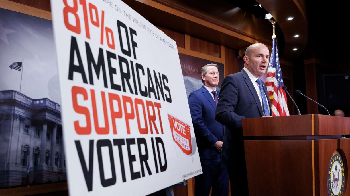 Sen. Mike Lee, R-Utah, joined by Sen. Rick Scott, R-Fla. ,and Sen. Jon Husted ,R-Ohio, speaks during a news conference regarding the SAVE Act on Capitol Hill on March 19, in Washington.