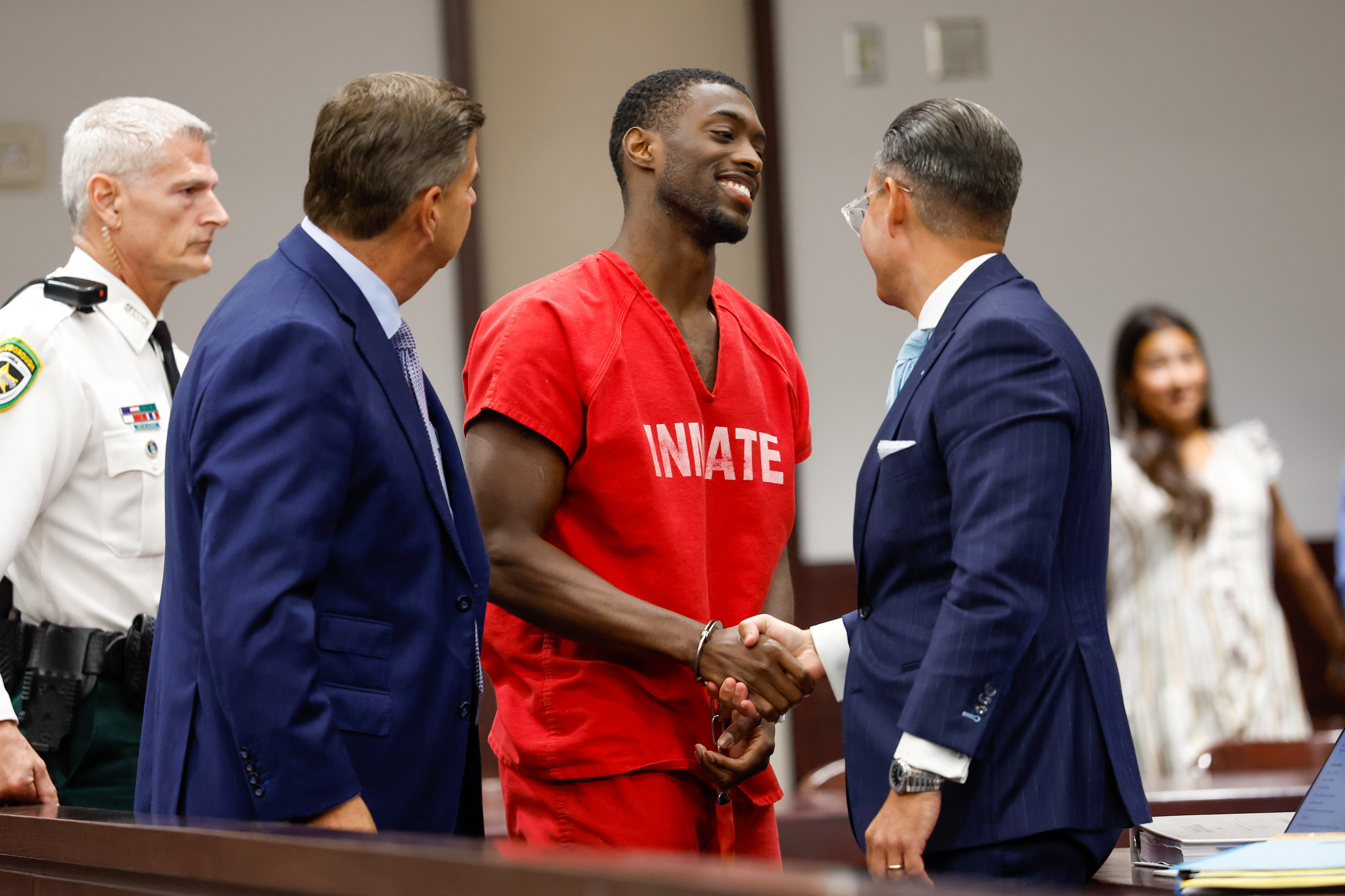 Terrion Arnold, a Detroit Lions cornerback, shakes hands with his attorneys R. Timothy Jansen, left, and A.J. Alvarez, during the conclusion of his pretrial detention hearing at the Hillsborough County Courthouse on Monday, June 29, 2026, in Tampa, Fla. 