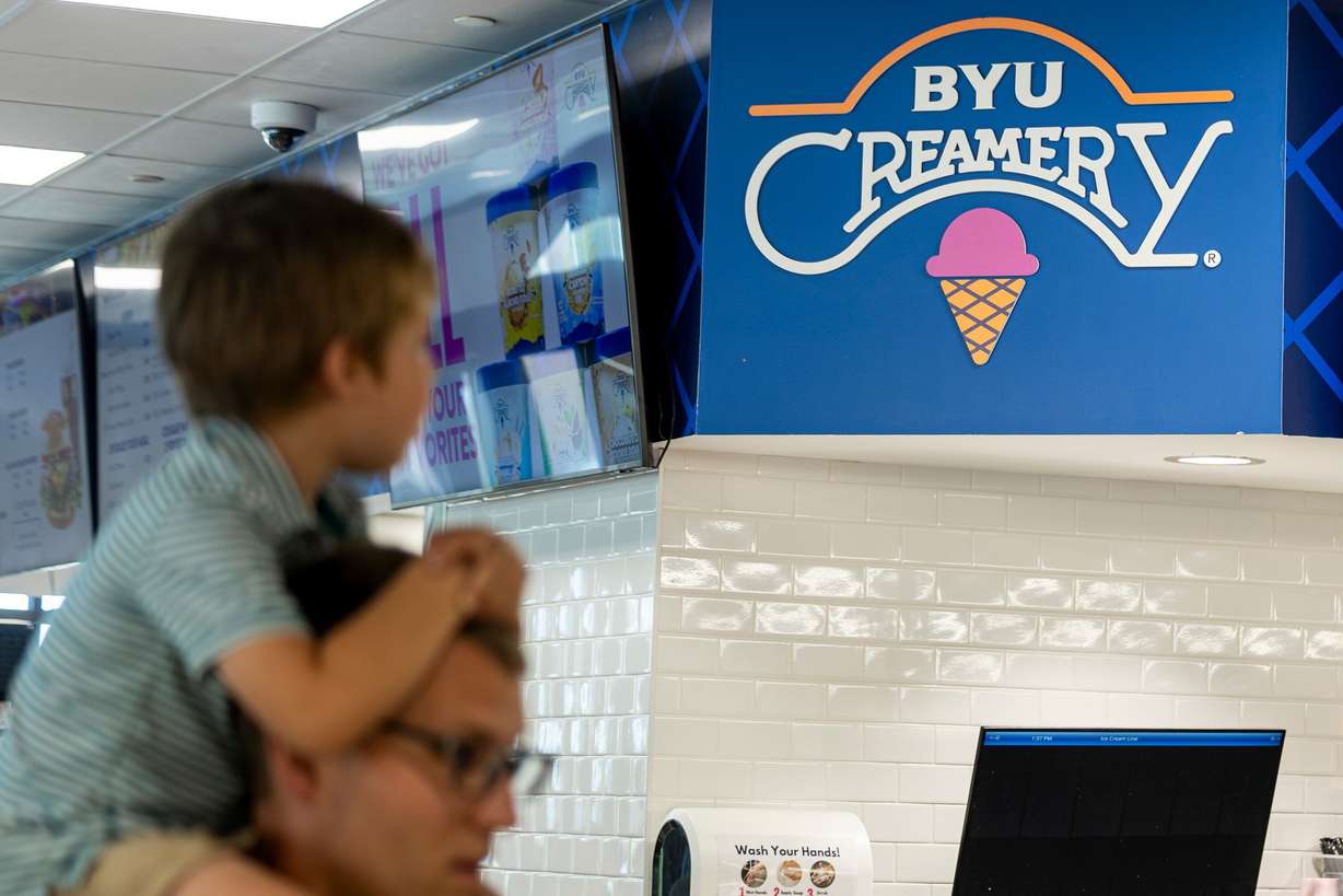 People wait in line for ice cream at the BYU Creamery on Ninth in Provo on June 15.