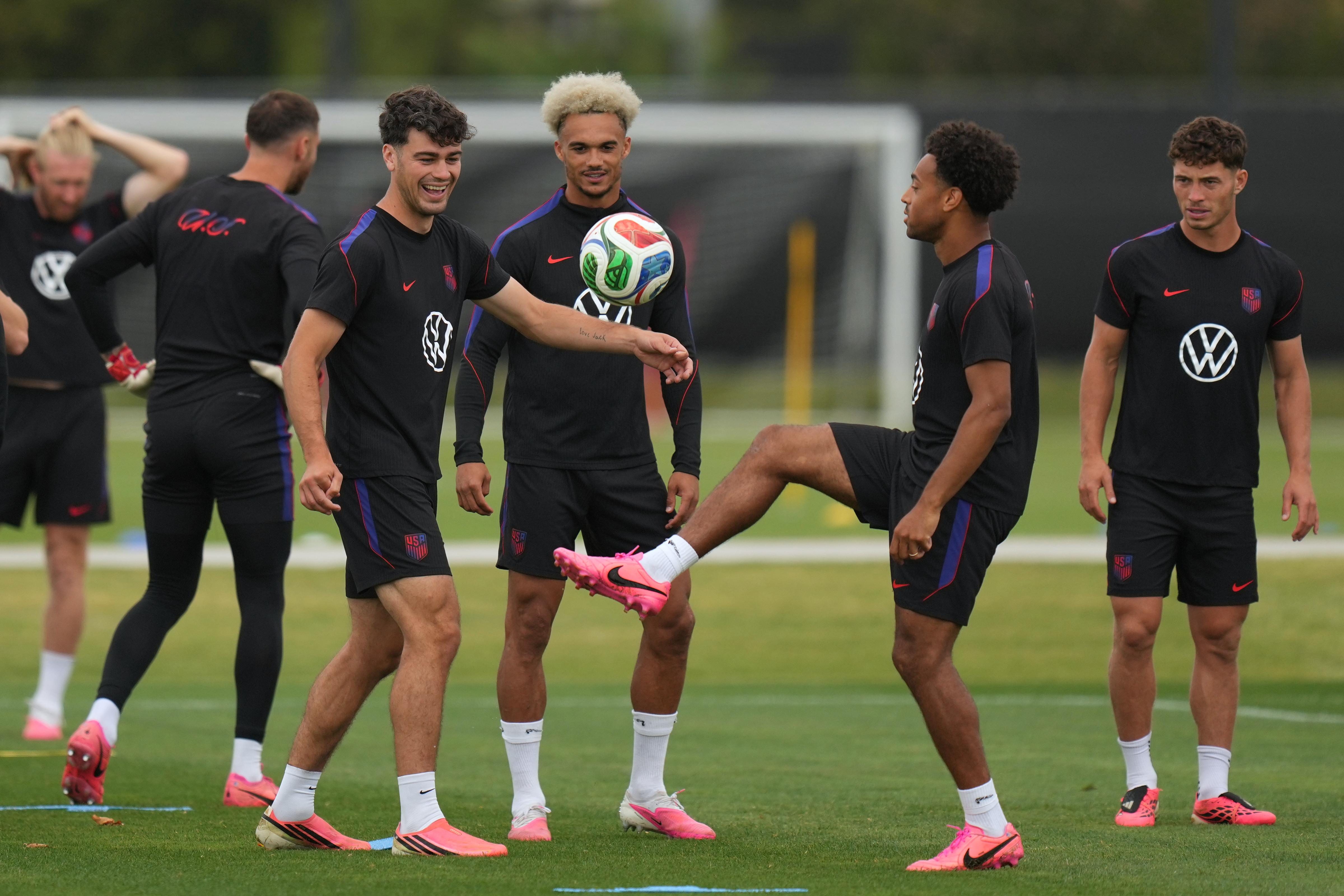 United States' Giovanni Reyna, center left, Antonee Robinson, center, and Tyler Adams practice during a training session ahead of their FIFA World Cup match against Bosnia in Irvine, Calif., Monday, June 29, 2026. 