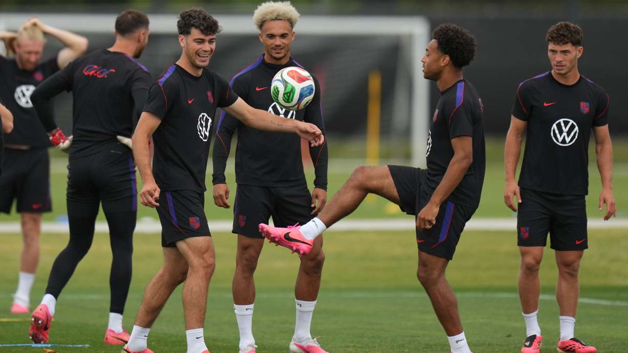 United States' Giovanni Reyna, center left, Antonee Robinson, center, and Tyler Adams practice during a training session ahead of their FIFA World Cup match against Bosnia in Irvine, Calif., Monday, June 29, 2026.