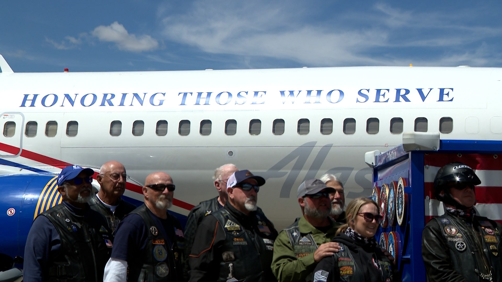 An American Airlines military-themed aircraft featuring the words "Honoring those who serve" is pictured on Monday.