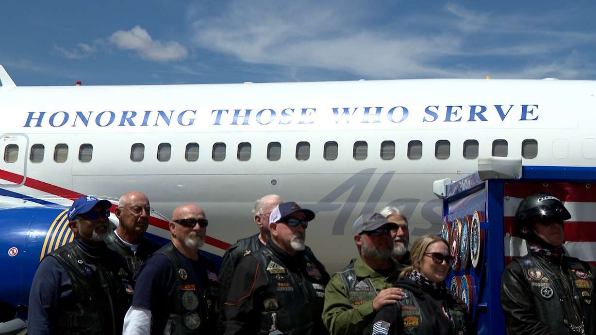 An American Airlines military-themed aircraft featuring the words "Honoring those who serve" is pictured on Monday.