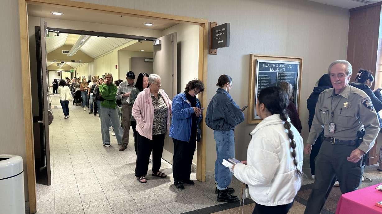 Long days and busy work for poll workers as they try to keep up with crowds