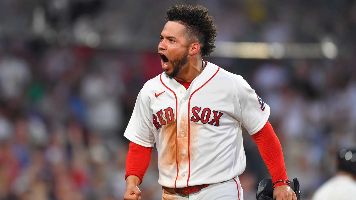 Boston Red Sox's Willson Contreras celebrates after scoring on a two-run single by Caleb Durbin in the fourth inning of a baseball game against the New York Yankees, Sunday, June 28, 2026, in Boston.
