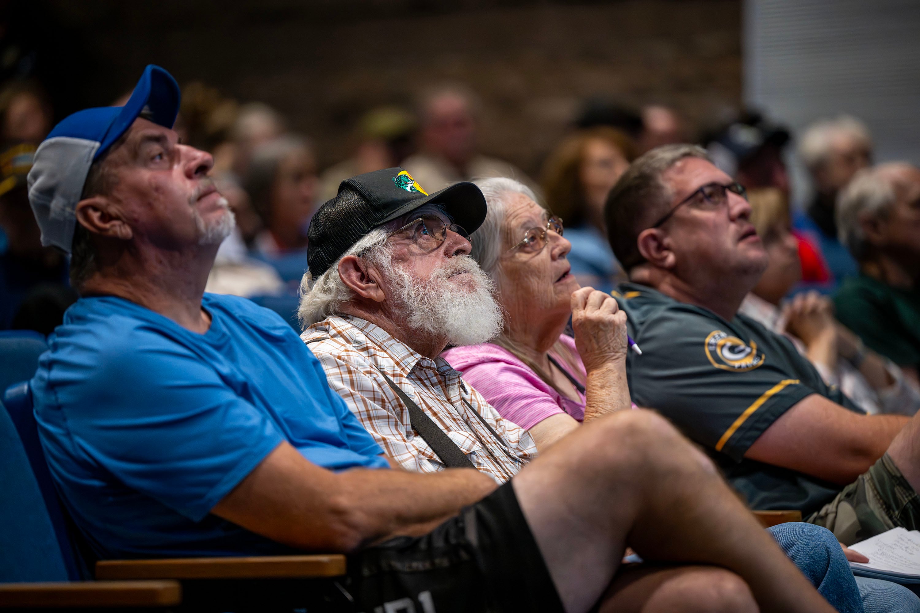 Beaver residents listen during a community meeting at Beaver High School discussing the Cottonwood Fire burning on the mountains east of Beaver on Monday. Residents were asked to pray for the firefighters battling the blaze.