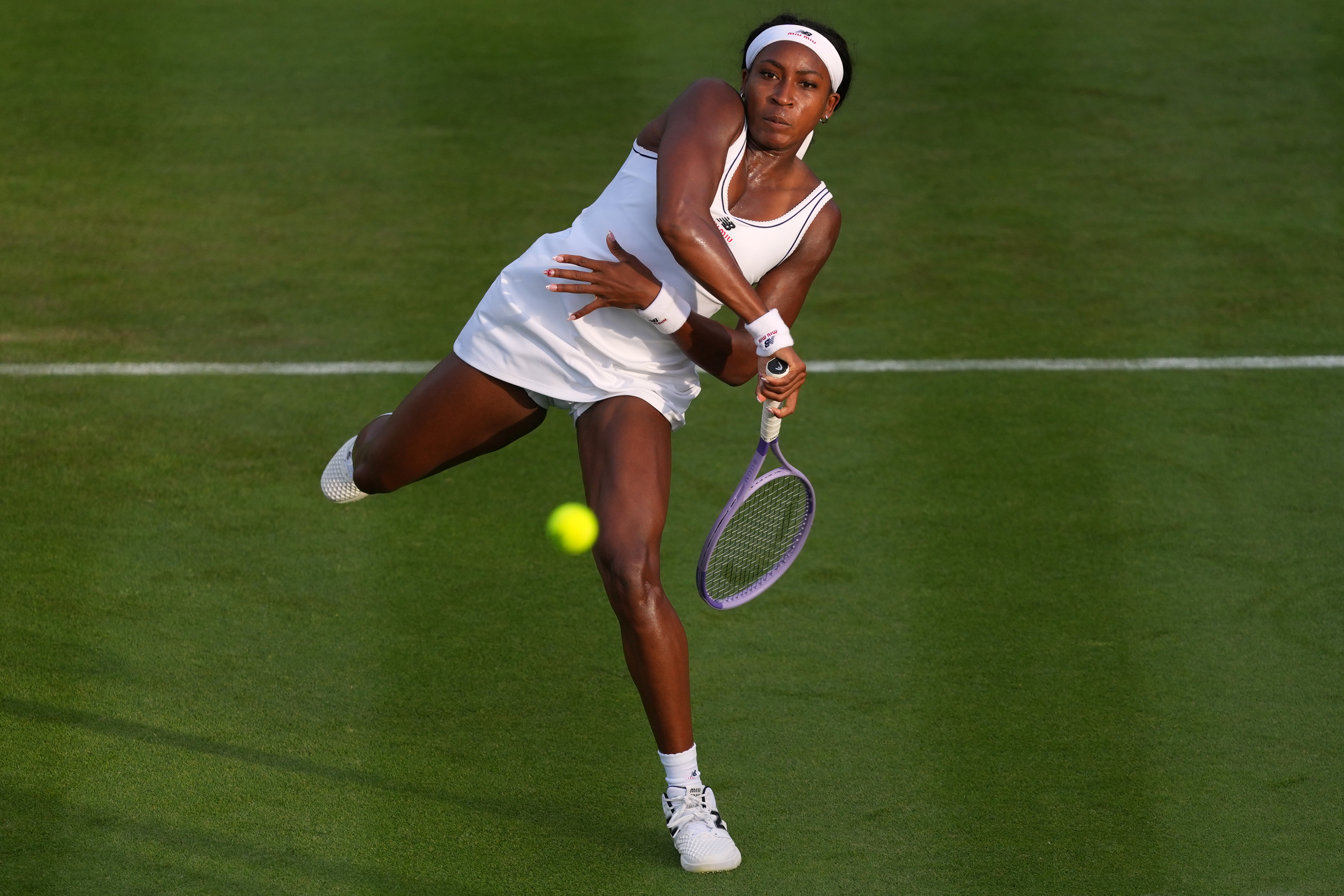 Coco Gauff of the United States plays a return to Tamara Korpatsch of Germany during the women's singles at the Wimbledon Tennis Championships in London, Monday, June 29, 2026.