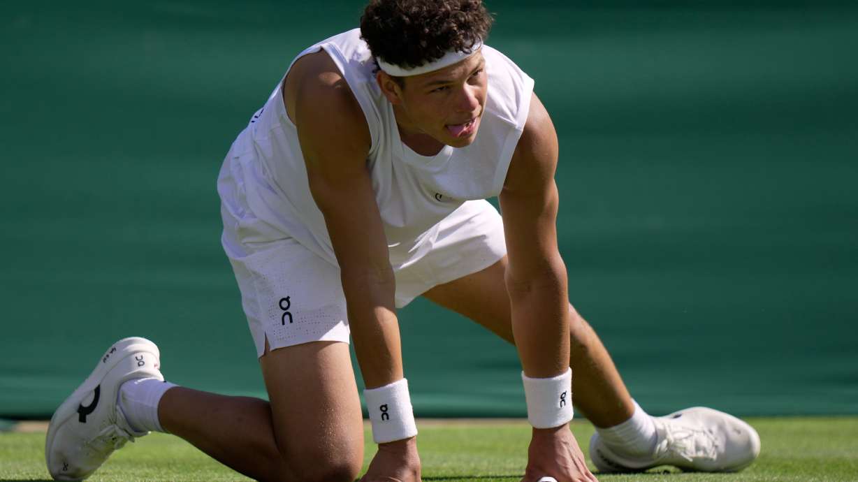 Ben Shelton of the United States reacts as he plays Otto Virtanen of Finland during their men's singles match at the Wimbledon Tennis Championships in London, Tuesday, June 30, 2026.