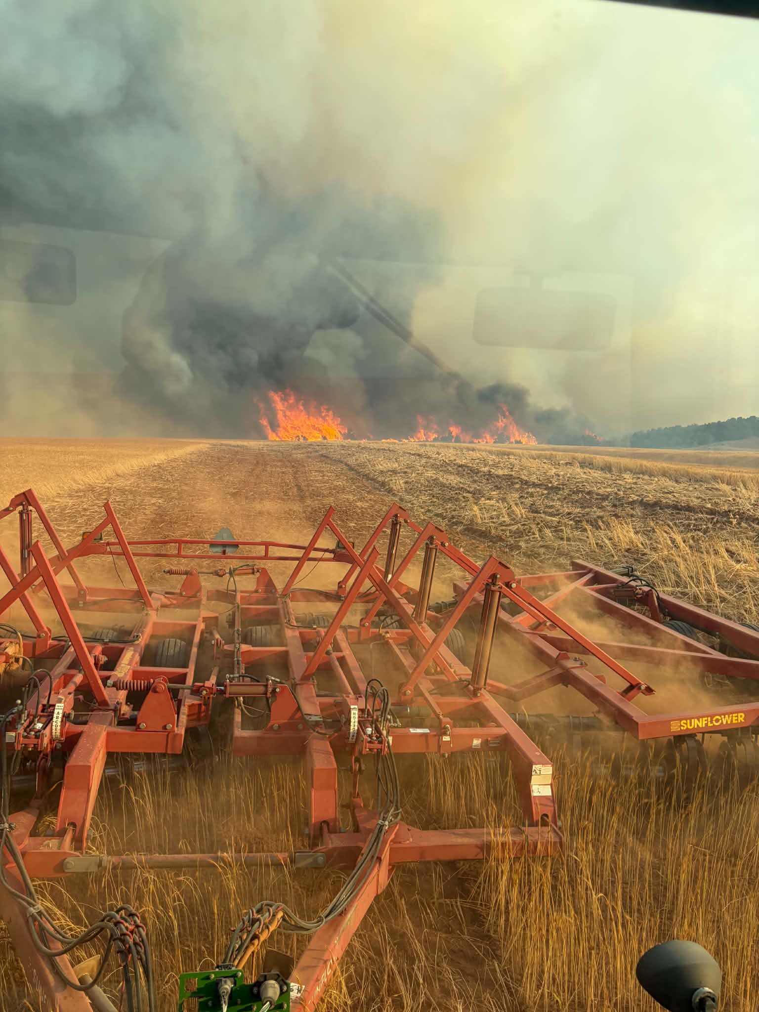 Farmer uses disc plow to help fight Monticello fire