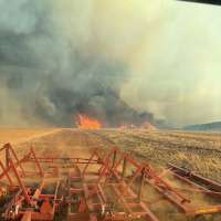 Farmer uses disc plow to help fight Monticello fire