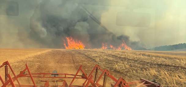 Farmer uses disc plow to help fight Monticello fire