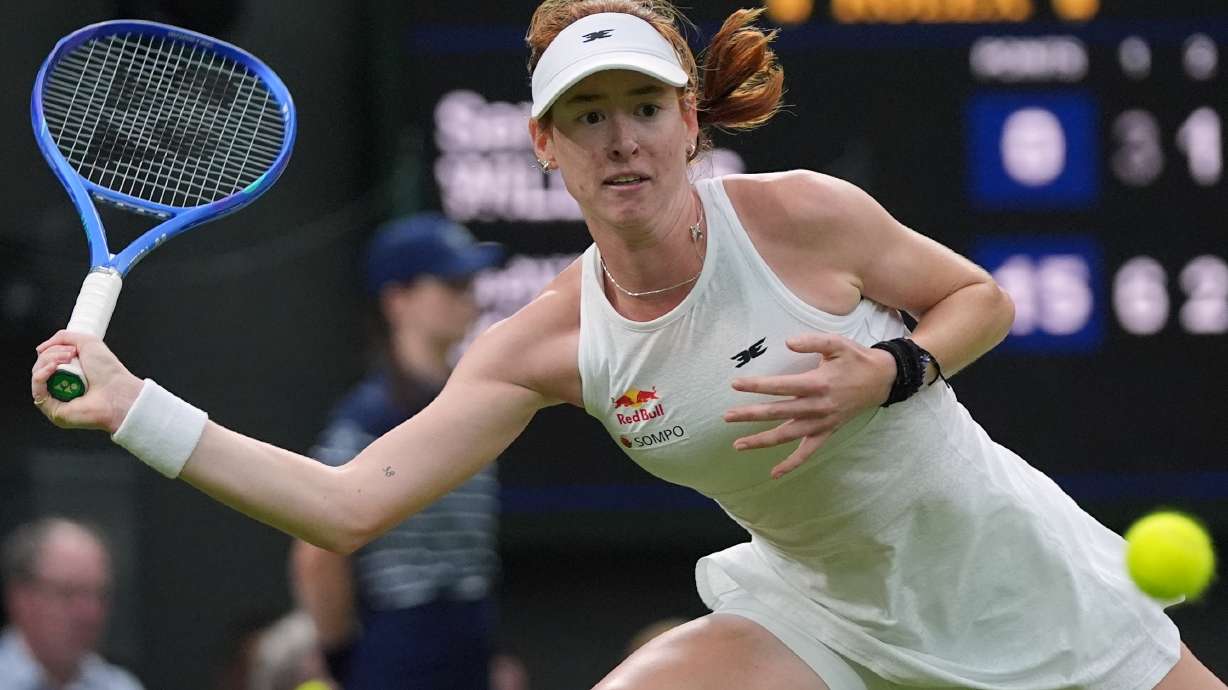 Maya Joint of Australia returns the ball to Serena Williams of the United States in their first round women's singles match at the Wimbledon Tennis Championships in London, Tuesday, June 30, 2026.