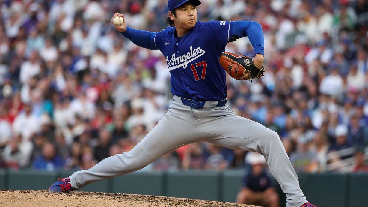 Los Angeles Dodgers starting pitcher Shohei Ohtani delivers against the Minnesota Twins during the sixth inning of a baseball game, Wednesday, June 24, 2026, in Minneapolis.