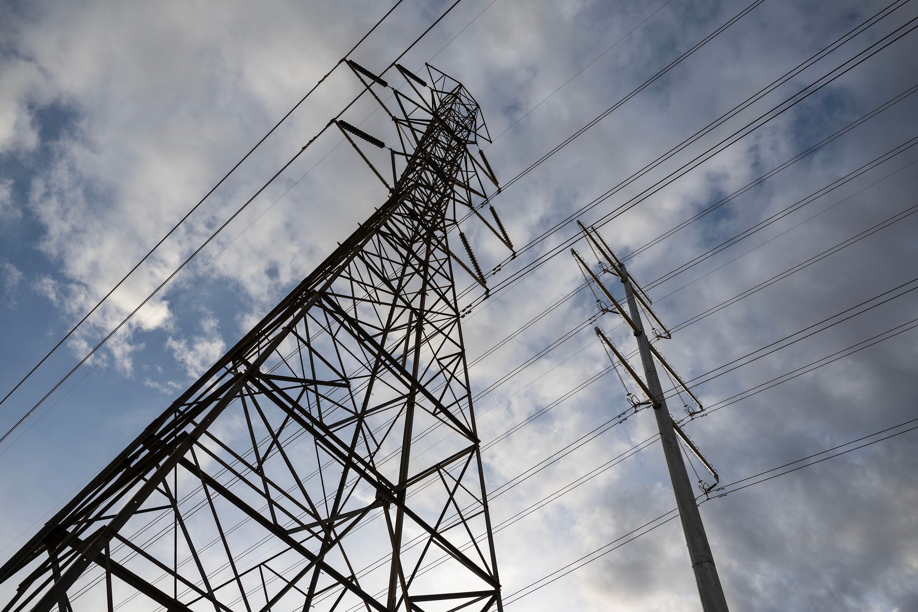Power lines and transmission lines in the West Jordan area of the Salt Lake Valley on Monday, Dec. 22, 2025.
