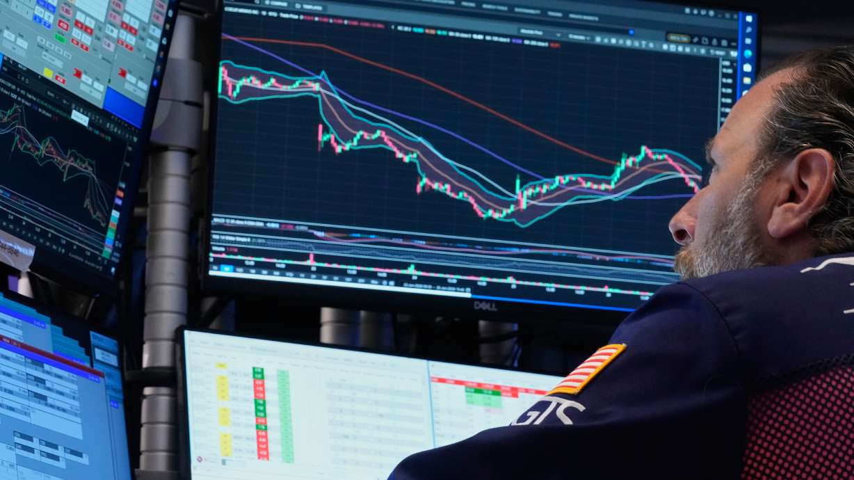 Specialist Michael Pistillo works on the floor of the New York Stock Exchange, June 26. The House on Wednesday took its first step to crack down on lawmakers trading stocks.