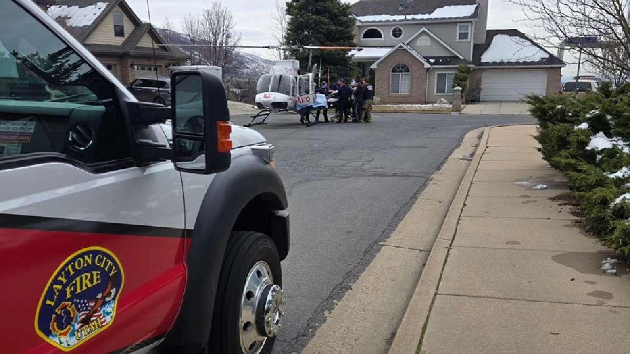 Two burned by powerlines while cleaning rain gutters, Layton police say