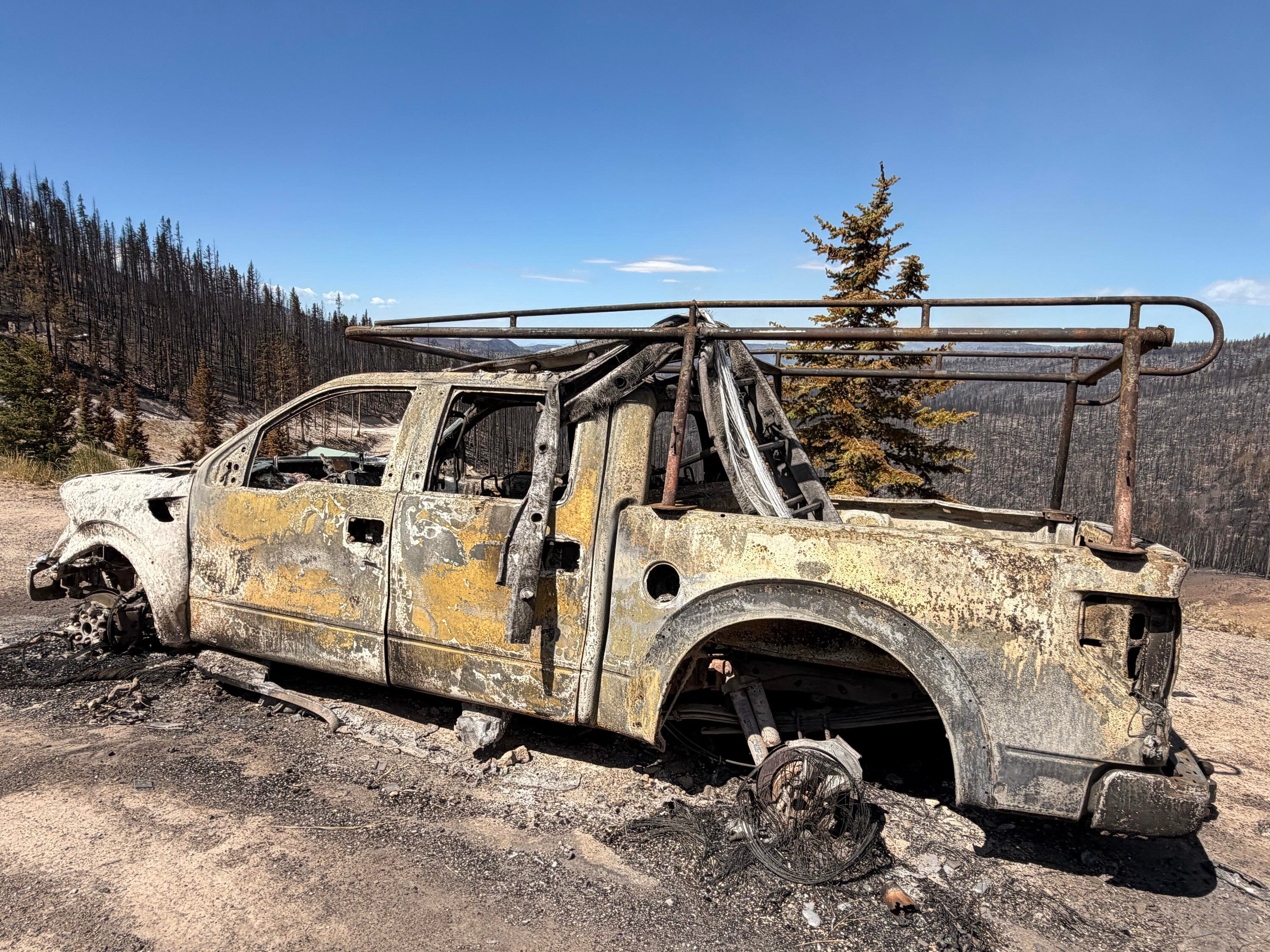 Charred remains of houses and vehicles in Eagle Point Resort’s West Village outside of Beaver, Tuesday, after the Cottonwood Fire torched much of the area. A dry winter and drier fuels have been the catalyst for Utah's active fire season so far.