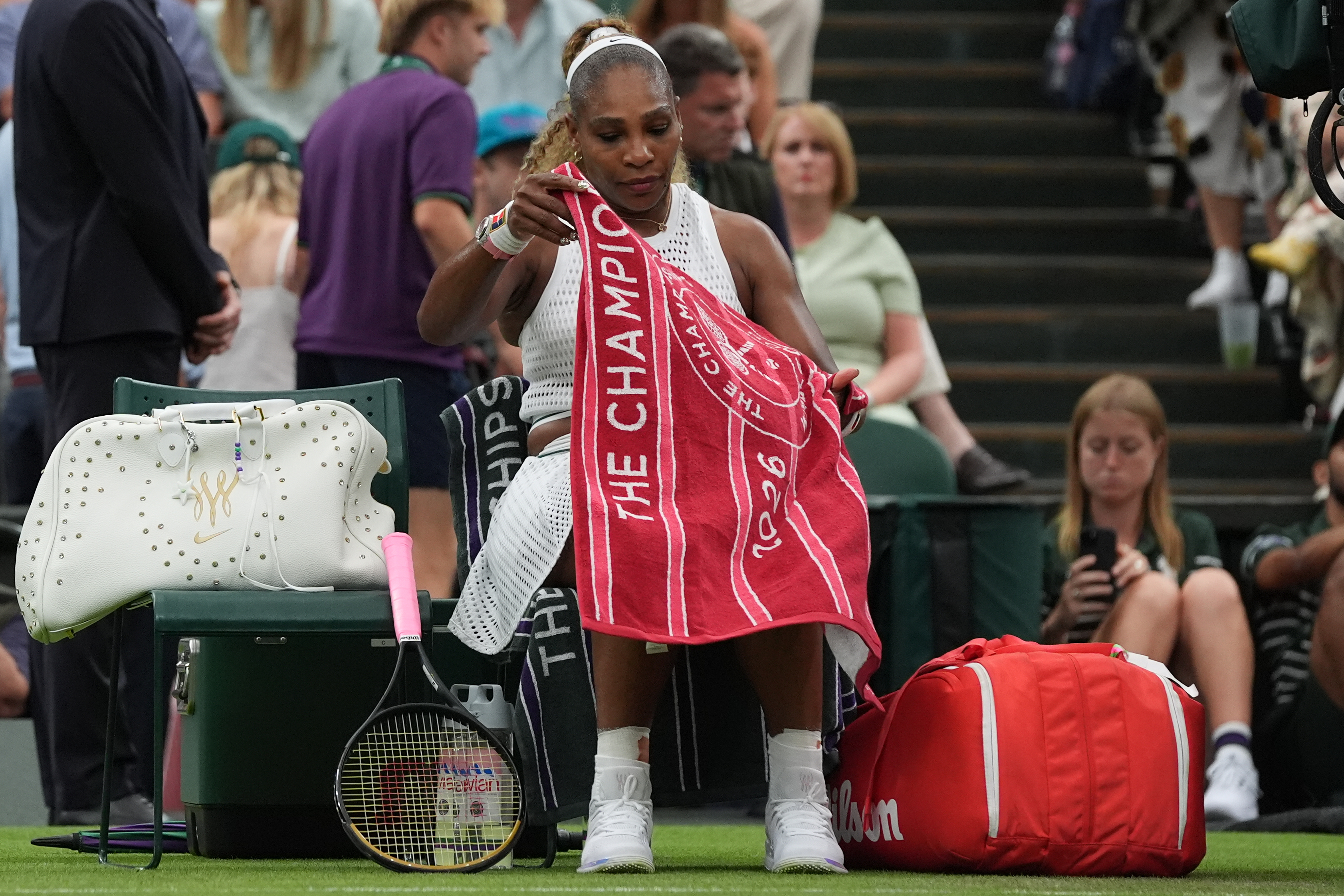 Serena Williams of the United States sits during a changeover in her first round women's singles match against Maya Joint of Australia, at the Wimbledon Tennis Championships in London, Tuesday, June 30, 2026. 