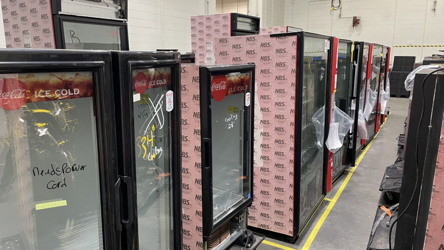 Soda coolers go to the parts department to be reinstalled with more efficient materials.