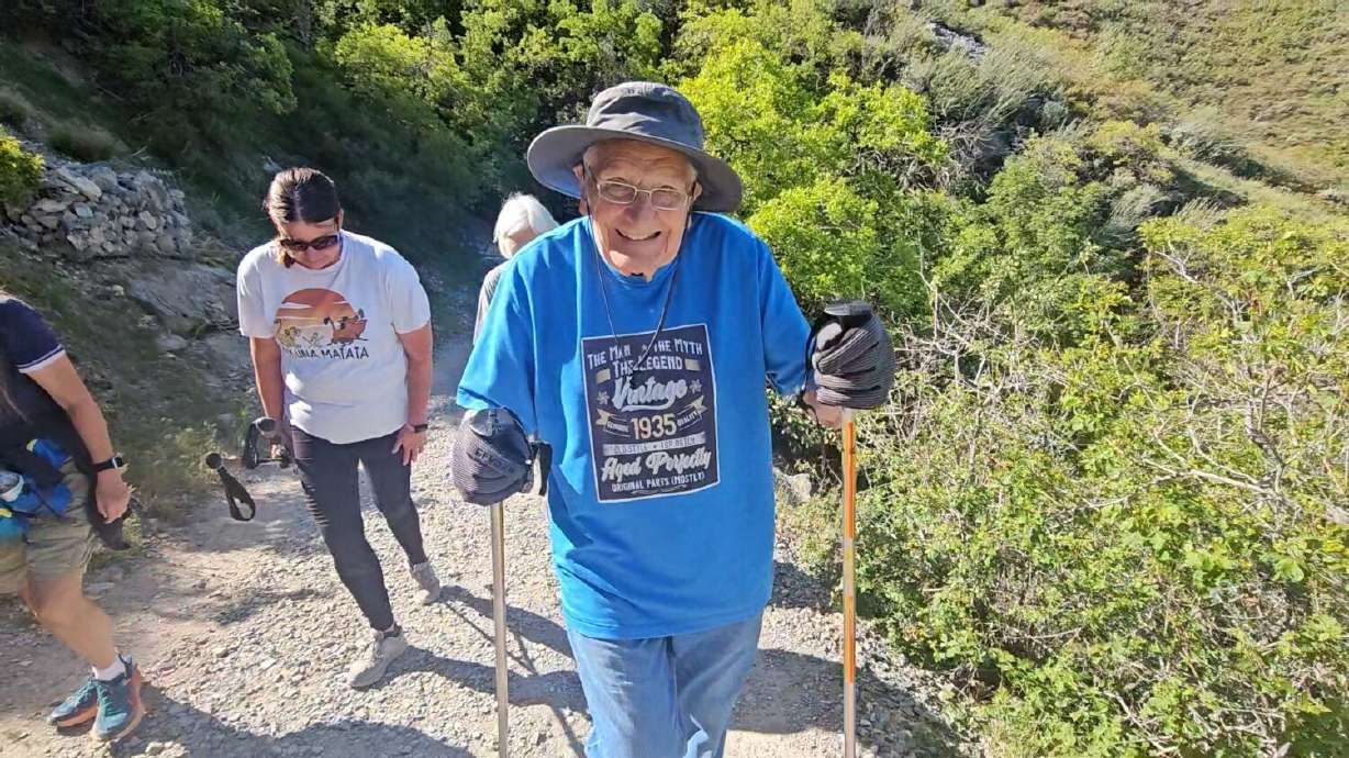 Henry Miles of Provo received a surprise from the community on his favorite hiking trail for his 90th birthday.