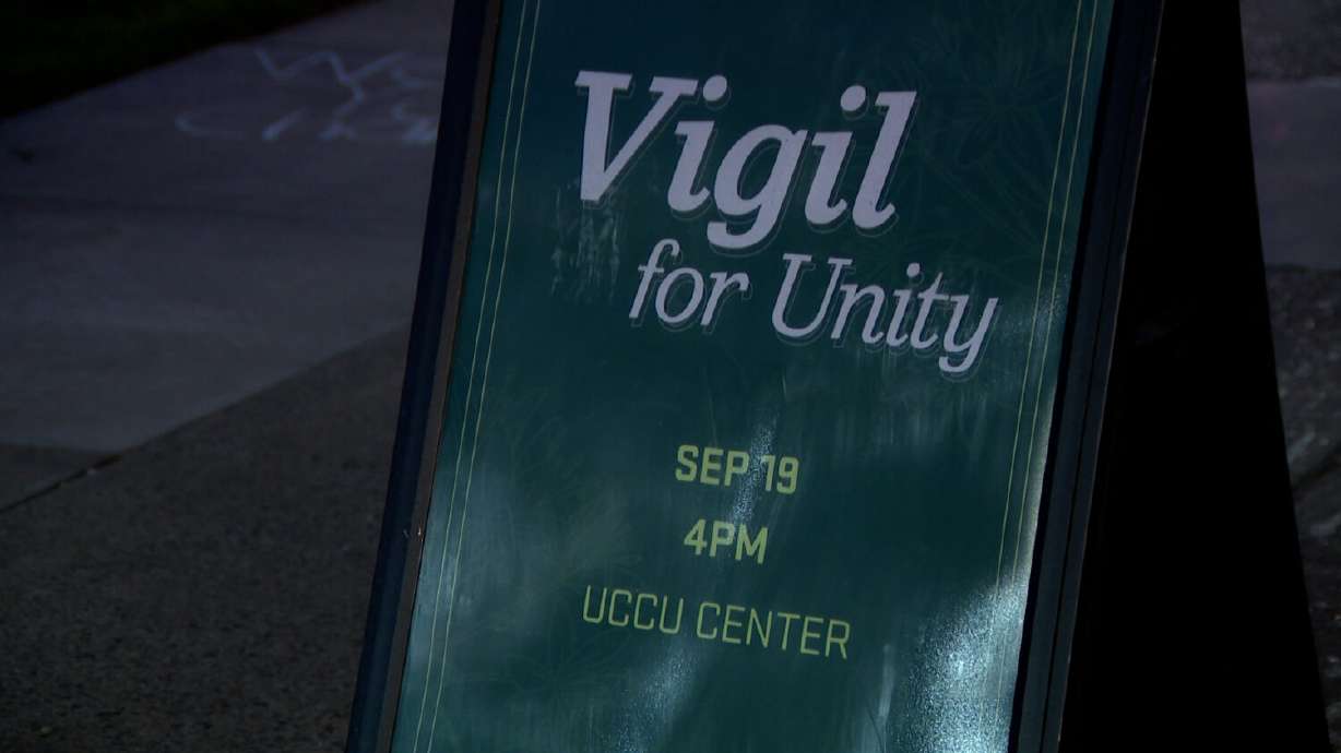 A sign advertising a "Vigil for Unity" is displayed on the campus of Utah Valley University in Orem on Thursday, Sept. 18, 2025.
