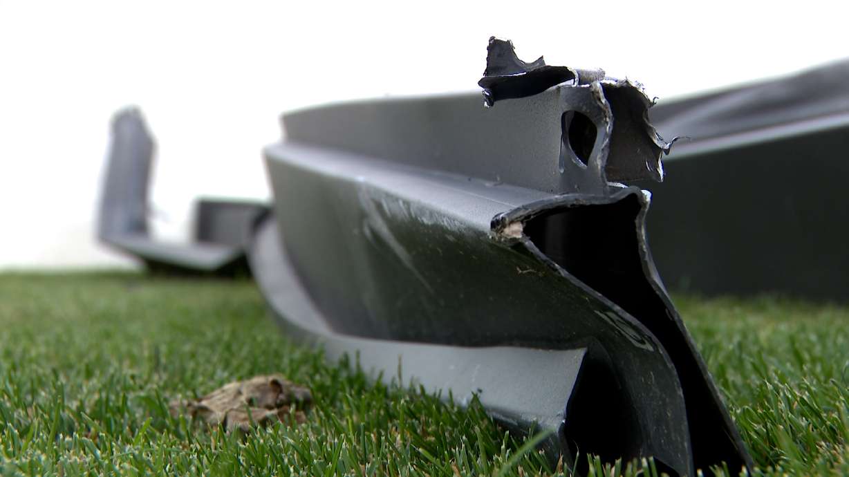 Wind lifts metal pergola into Lehi home