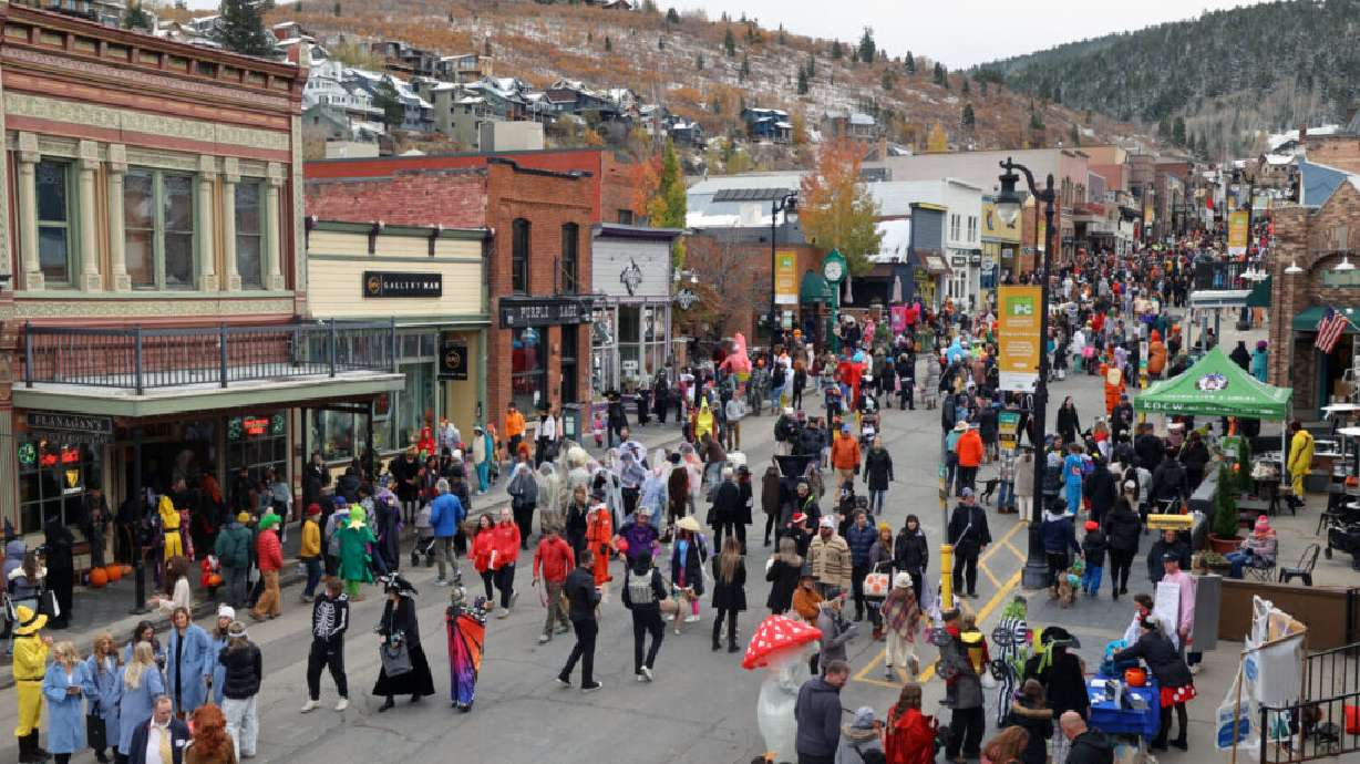 Adults, kids and pets show off their Halloween costumes on Main Street in Park City on Thursday, Oct. 31, 2024.