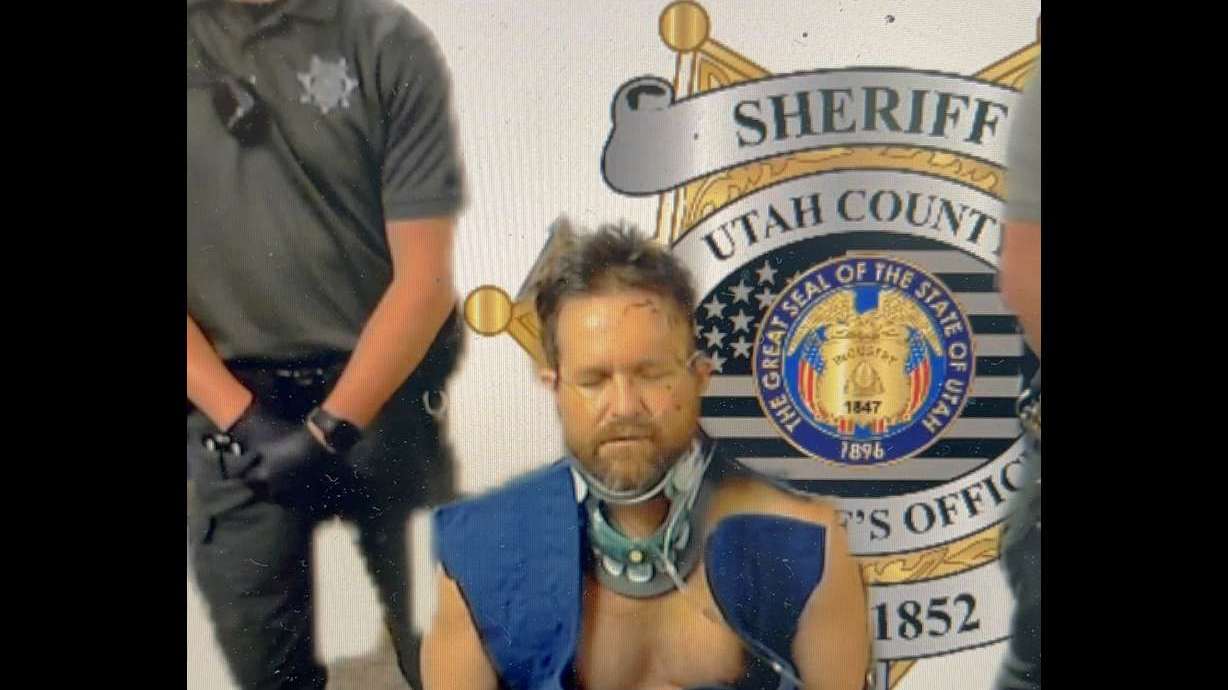Michael Aaron Jayne appears in 4th District Court from a wheelchair on Wednesday, May 15.