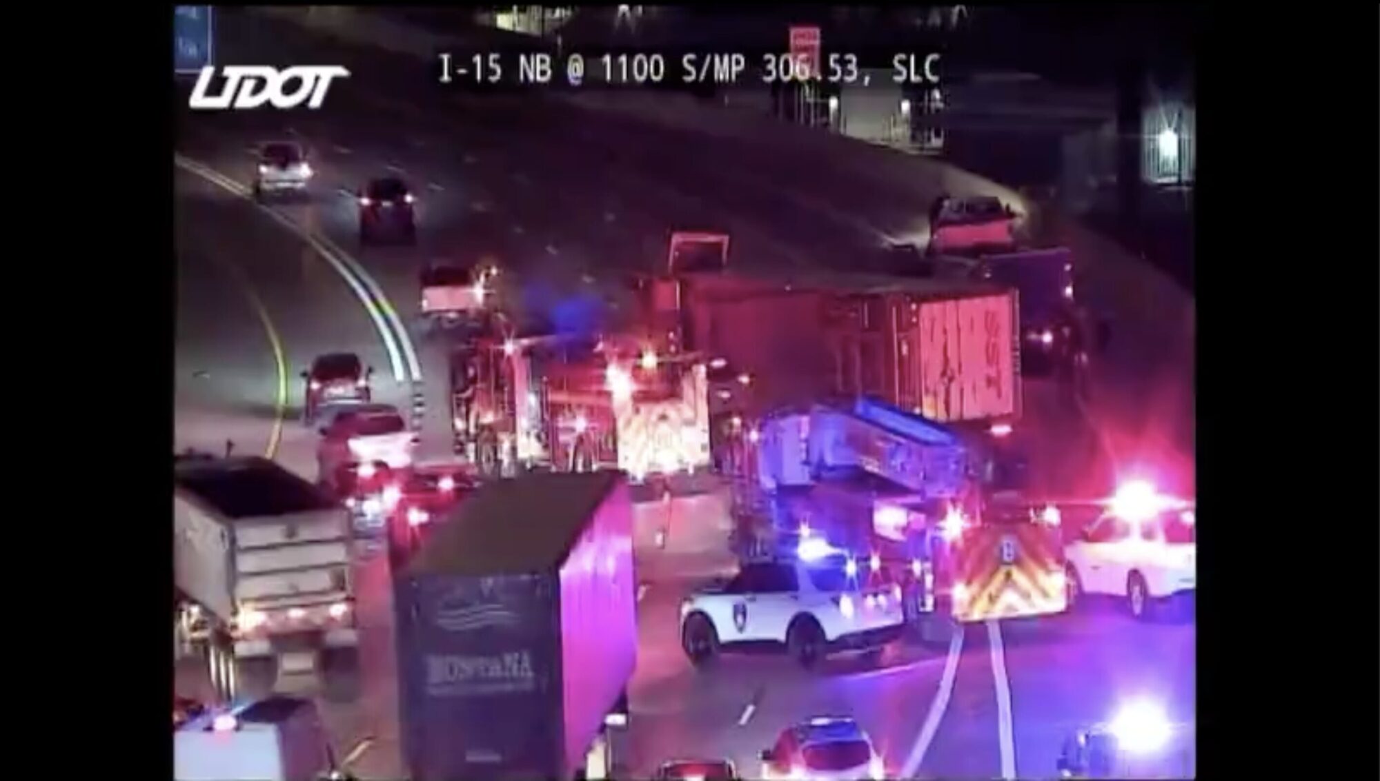 Semitruck rolls on I-15 near downtown Salt Lake during Monday commute ...