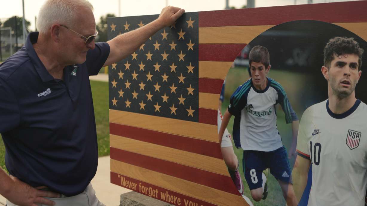 Pennsylvania Classic co-founder and president, Doug Harris, looks at a banner of U.S. national team soccer player, Christian Pulisic, who was born in nearby Hershey, and honed his skills at the club in Manheim, Pa., on Monday, June 29, 2026.