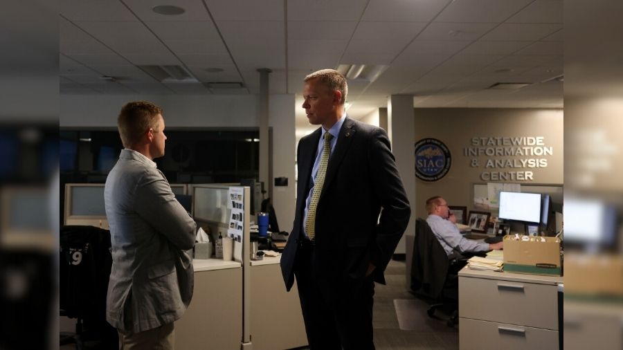 Utah Department of Safety Capt. Tanner Jensen, left, speaks with Commissioner Jess Anderson, Utah’s Commissioner of Public Safety, in the Statewide Information & Analysis Center at the Utah Department of Public Safety building in Taylorsville on Wednesday, Aug. 31, 2022.
