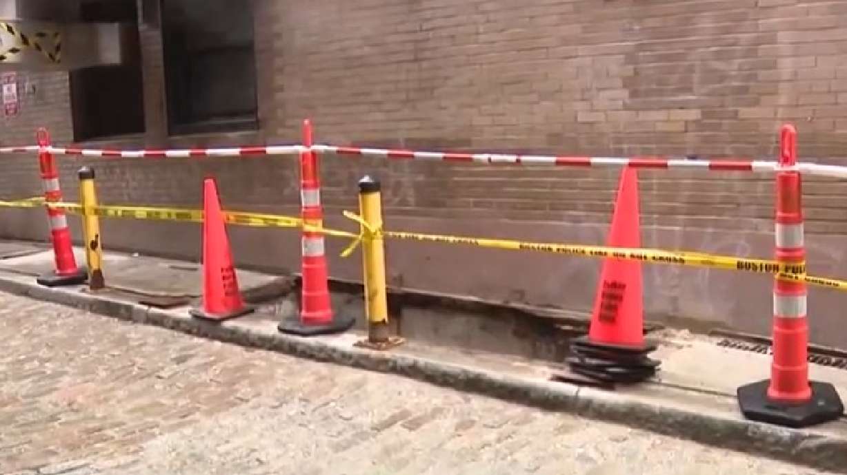 Worker falls down old coal chute outside hotel in Boston