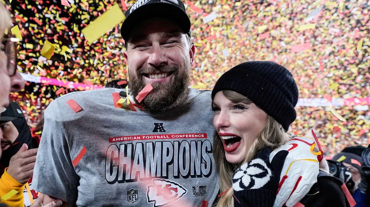 FILE - Travis Kelce, left, and Taylor Swift pose after the AFC Championship NFL football game against the Buffalo Bills, Jan. 26, 2025, in Kansas City, Mo.