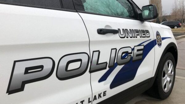 A Unified police officer was legally justified in shooting at a wanted man driving directly at him, the Salt Lake County District Attorney's Office announced Wednesday.