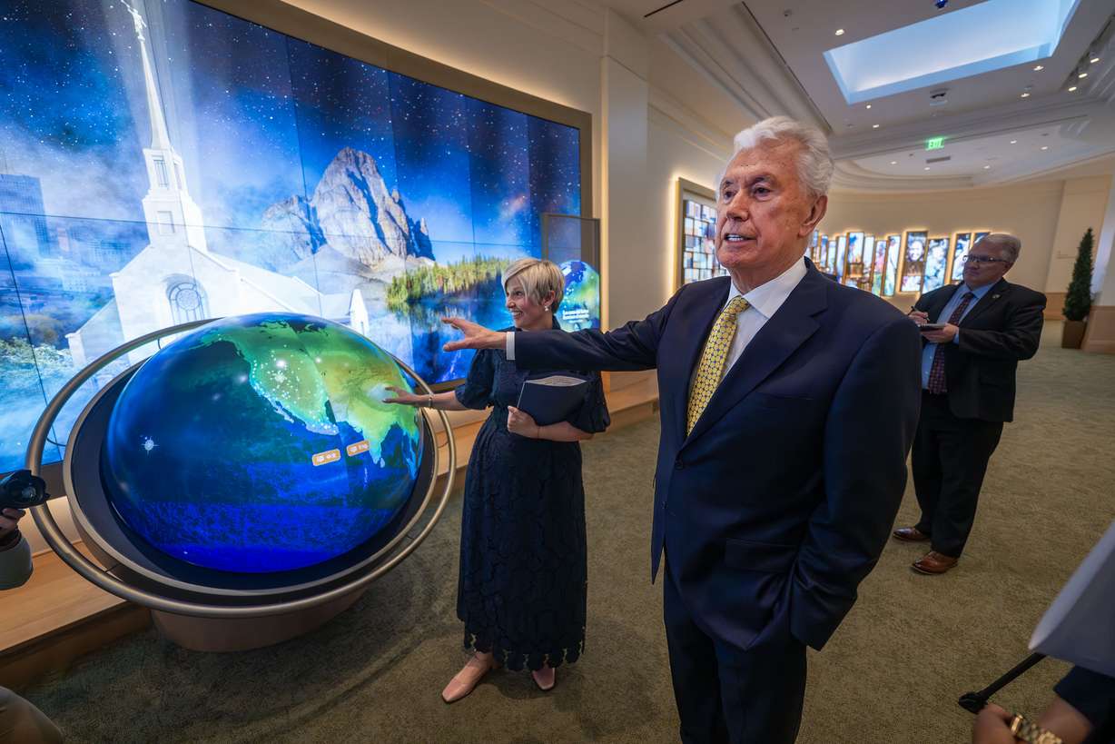 President Emily Belle Freeman, Young Women general president for The Church of Jesus Christ of Latter-day Saints, and President Dieter F. Uchtdorf, acting president of the Quorum of the Twelve Apostles of The Church of Jesus Christ of Latter-day Saints, talk with media members during a tour of the new visitors' center on Temple Square in Salt Lake City on Monday, April 13, 2026.