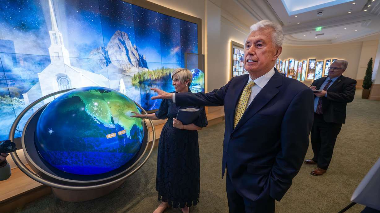 President Emily Belle Freeman, Young Women general president for The Church of Jesus Christ of Latter-day Saints, and President Dieter F. Uchtdorf, acting president of the Quorum of the Twelve Apostles of The Church of Jesus Christ of Latter-day Saints, talk with media members during a tour of the new visitors' center on Temple Square in Salt Lake City on Monday, April 13, 2026.