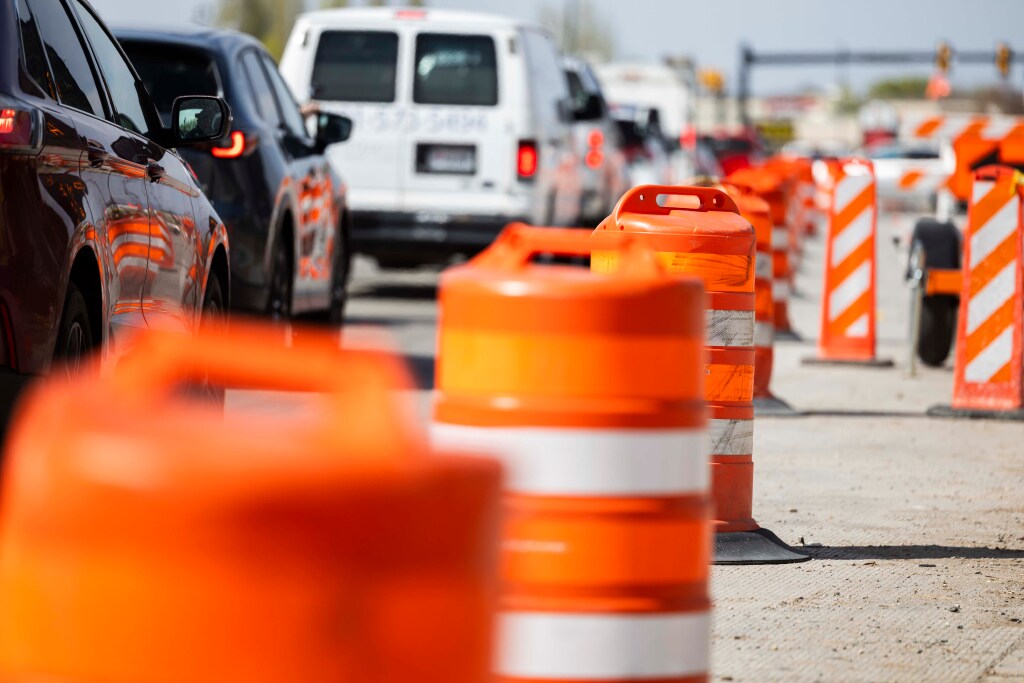 Cars pass through a construction zone connected to a project to widen 1800 North in Sunset on Tuesday, April 15, 2025. (Brice Tucker, Deseret News)