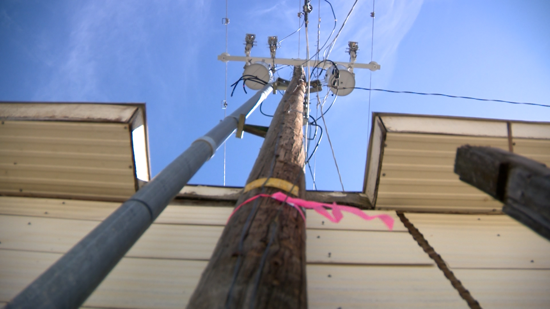 Power pole vs. garage: Homeowner says she's got four weeks to move garage or her power gets cut