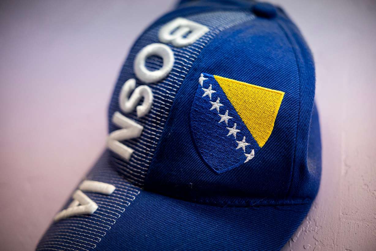 A hat commemorating Bosnia and Herzegovina is displayed at Old Bridge Cafe in South Salt Lake on Wednesday.